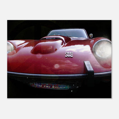 Foto på en röd saab sonett med lysande lyktor